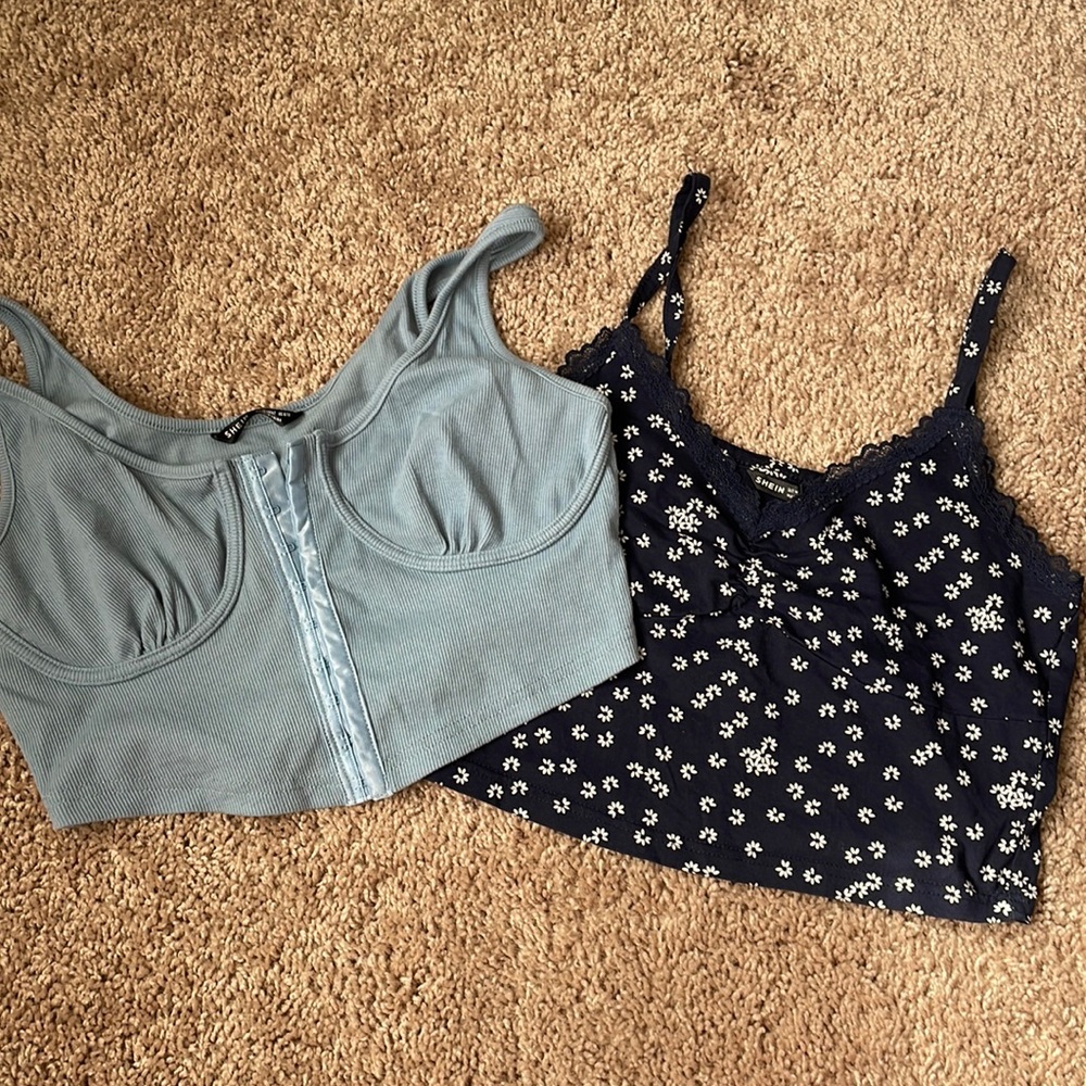 Set is 2 blue crop tank tops! Never worn